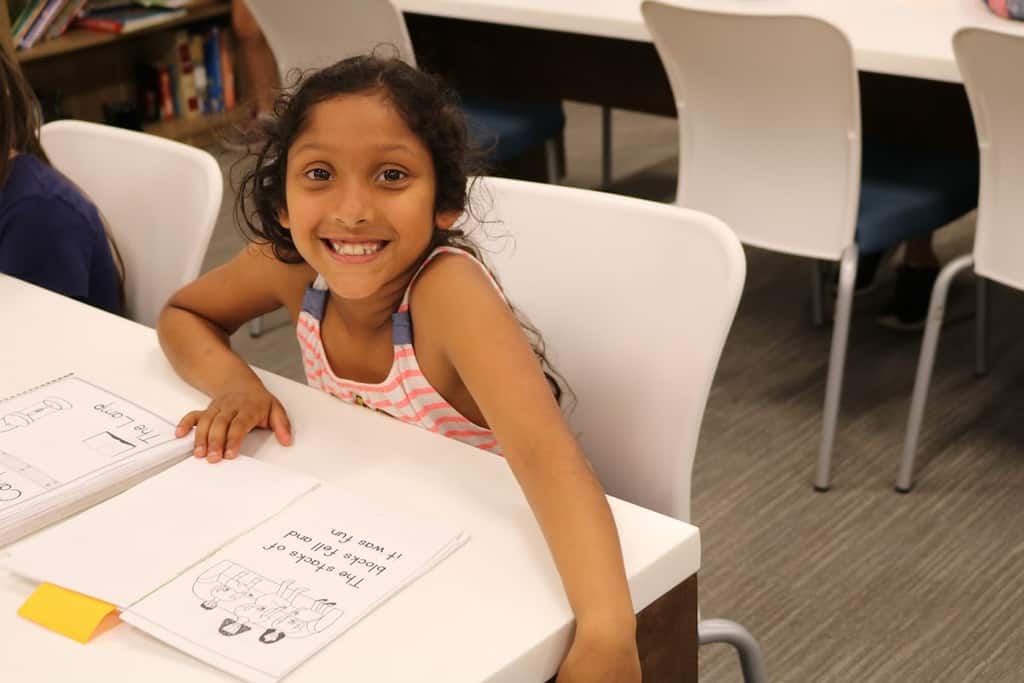 CLC Academy student working on classroom material